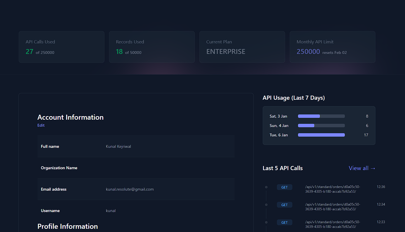Walnut organizer base with white polycarbonate trays in the kitchen with various kitchen utensils.